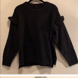 Black knit long sleeve sweater with ruffles